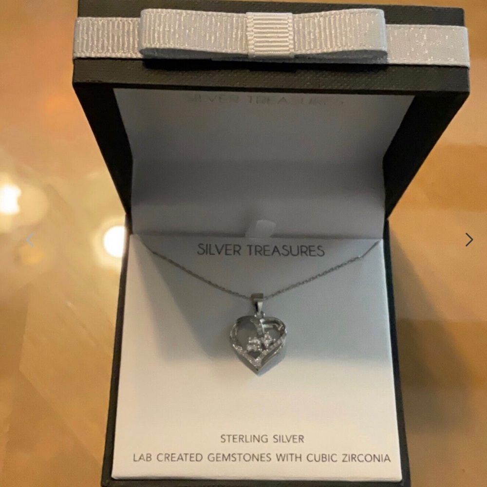 Sterling Silver Cubic Zirconia Heart Charm Pendant Necklace.